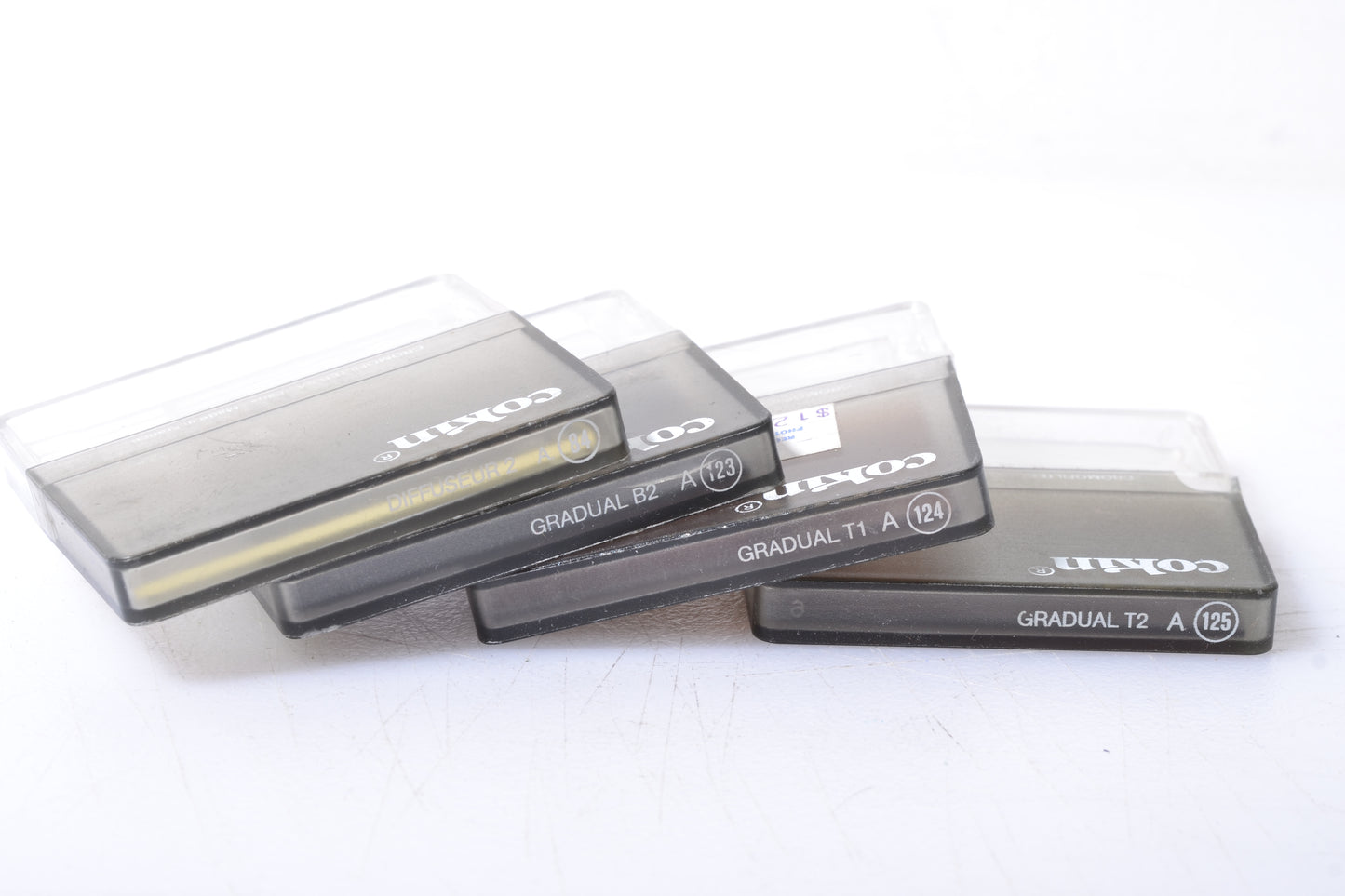 Set of 4X Cokin A series filters: 84, 123, 124, 125 Diffuser and graduated filters