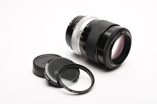 Nikon Nikkor-Q.C 135mm f2.8 Non-AI lens, caps, Mint- + UV