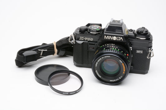 Minolta X700 35mm SLR w/50mm f2 lens, strap, cap, sky, new seals, nice!