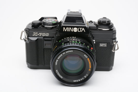 Minolta X700 35mm SLR w/50mm f2 lens, strap, cap, sky, new seals, nice!