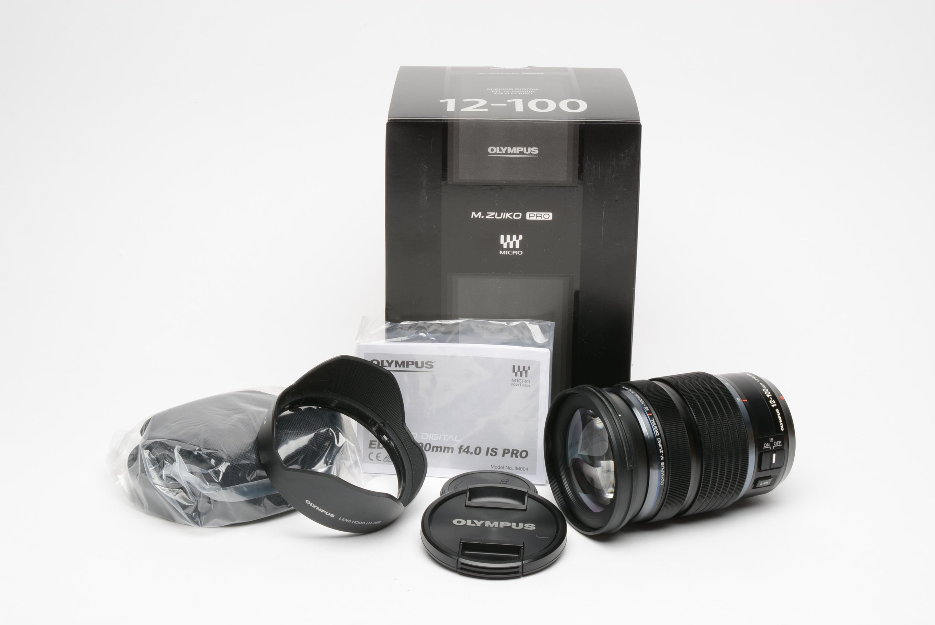 Olympus OM 12-100mm f4 IS Pro M.Zuiko Digital lens, caps, pouch