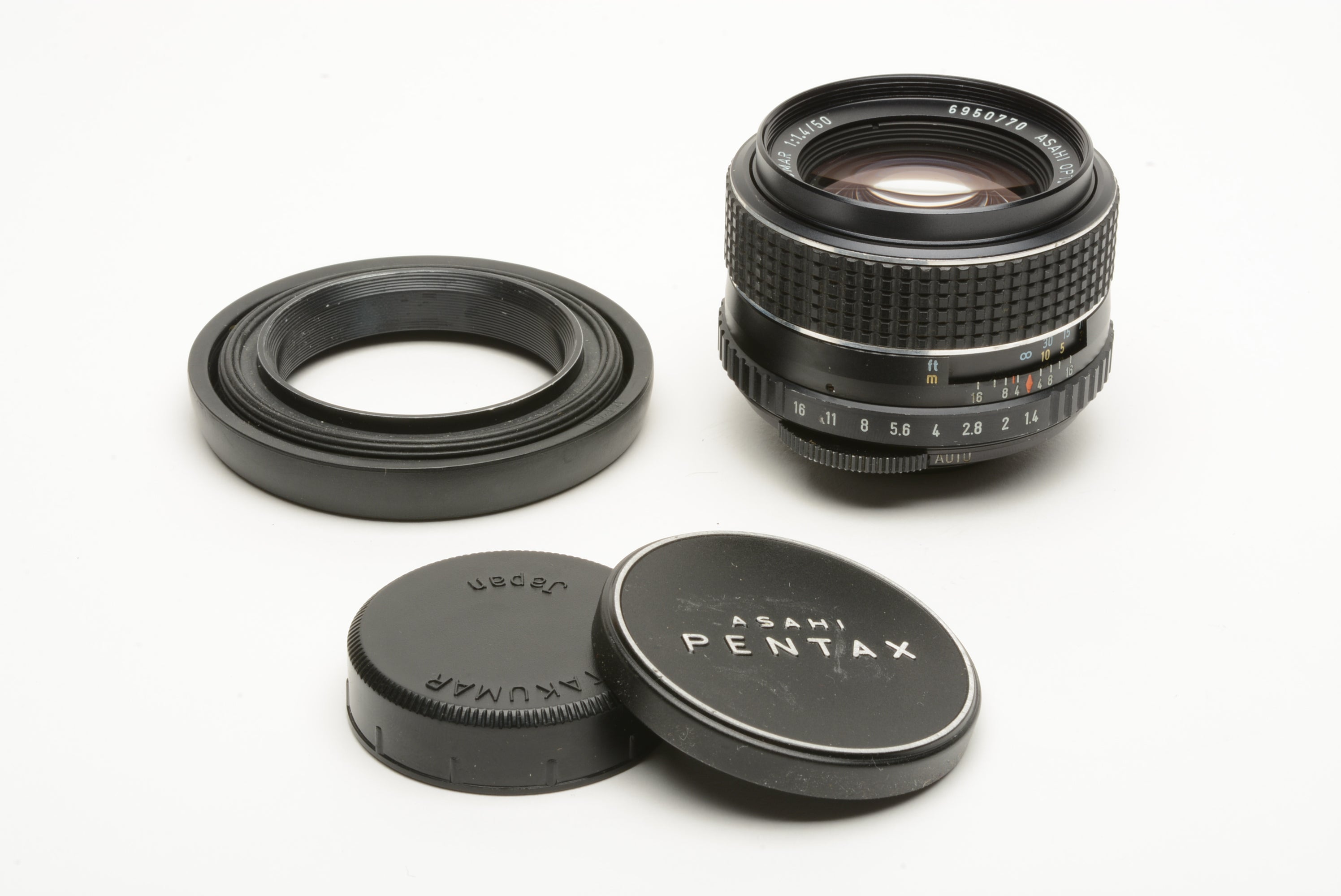 Pentax SMC Takumar 50mm f/1.4 Lens w/rubber hood, caps, nice 