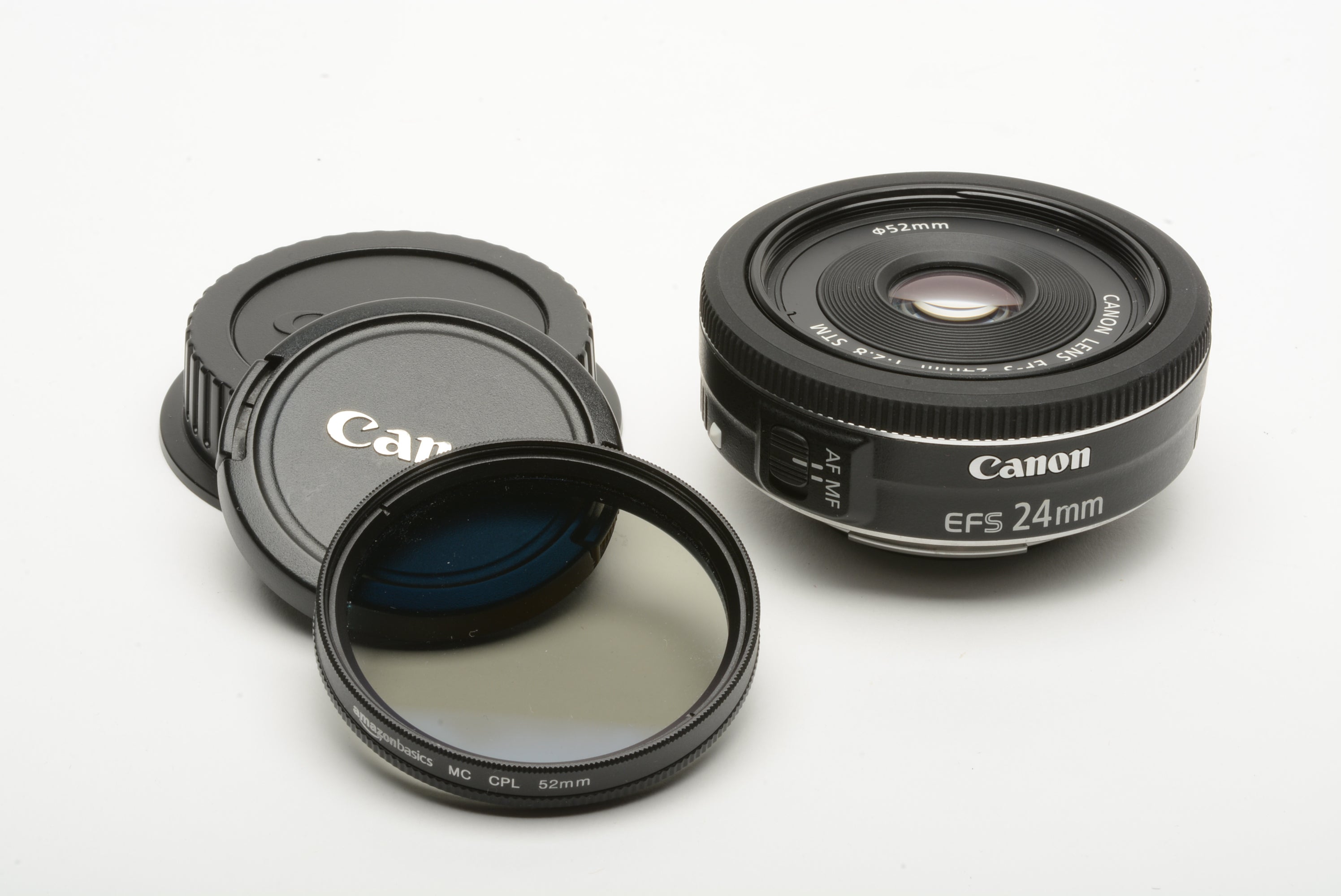 Canon 24mm f2.8 STM pancake lens, caps + Polarizing filter