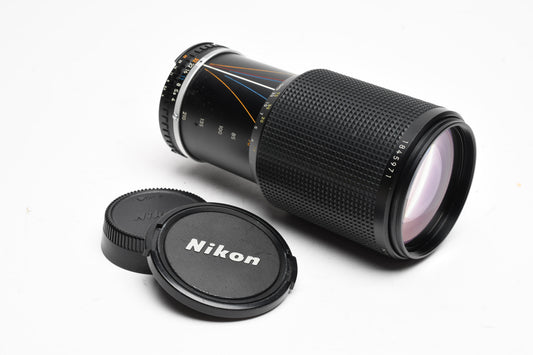Nikon MF 70-210mm Series E f4 lens, caps, UV, Haze, still good