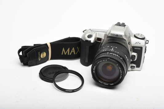 Minolta XTsi Date 35mm SLR w/Sigma 28-105mm f4-5.6 zoom, UV, Strap