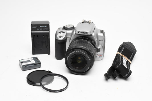 Canon Rebel XTi Silver DSLR w/18-55mm f3.5-5.6 II Zoom Lens, UV, Strap, Batt, Charger