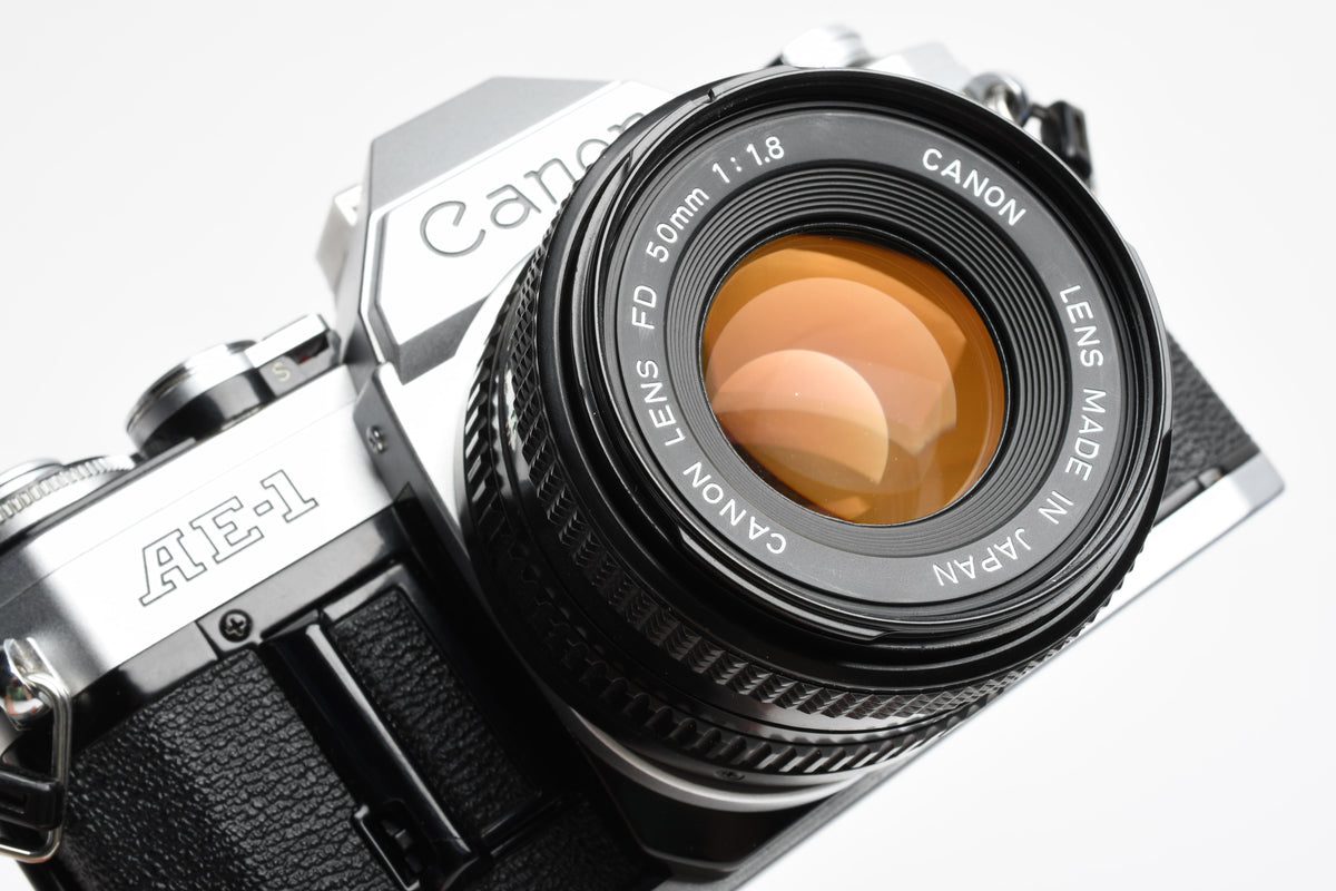 Canon AE-1 35mm SLR Camera w/50mm f1.8 Lens, UV, New Seals! Very clean!