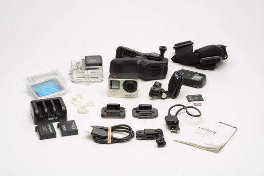GoPro Hero 4 Bundle:  2batts, charging module, 32GB Micro SD, Housing+Accessories