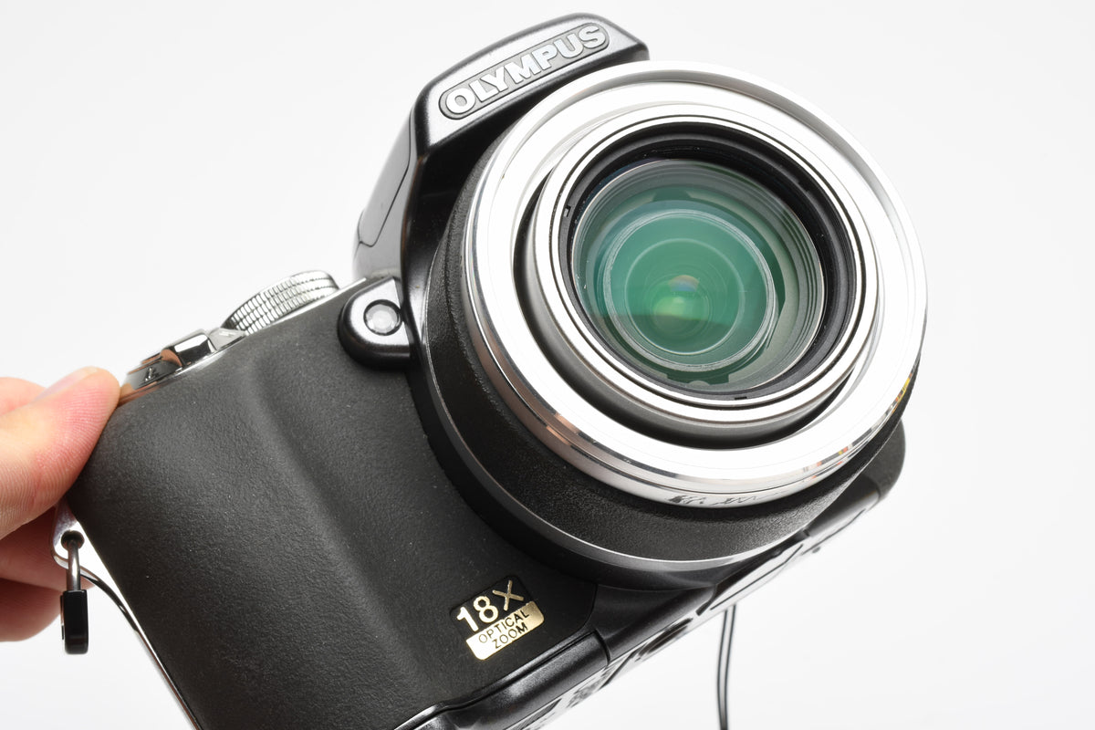 Olympus SP-550UZ 7.1MP Digital Point&Shoot w/strap, 2GB XD Card, Tested, Read*