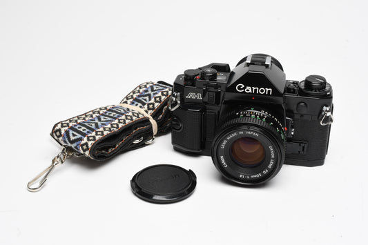 Canon A-1 35mm SLR w/ 50mm f1.8 FD Lens, Canvas Strap, New Seals, Great!