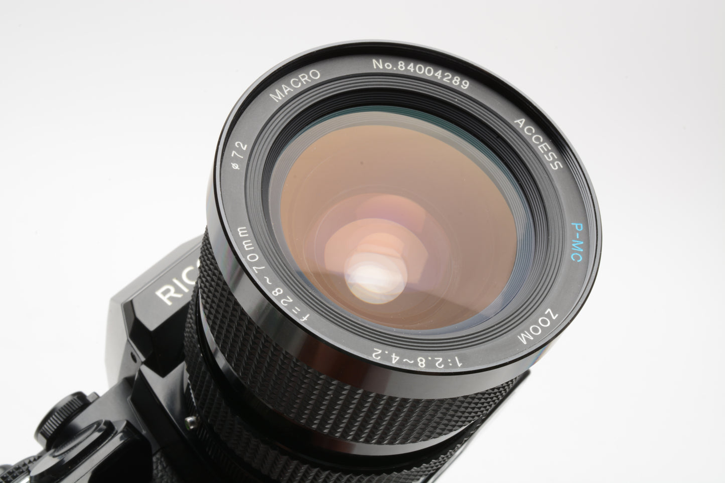 Ricoh XR-P 35mm SLR w/Access 28-70mm zoom lens, manual, strap, tested, great!