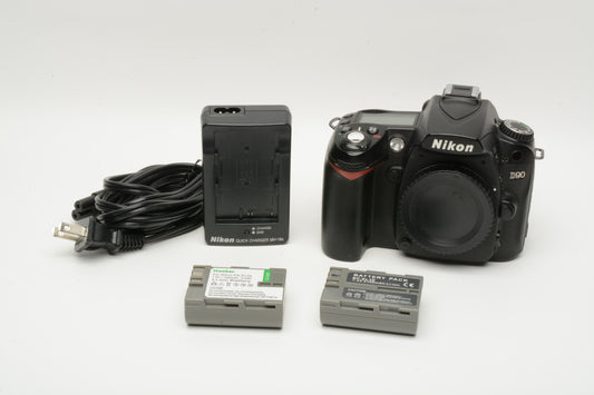 Nikon D90 DSLR body, 2X batts, charger, LCD cover, 29K Acts, works great
