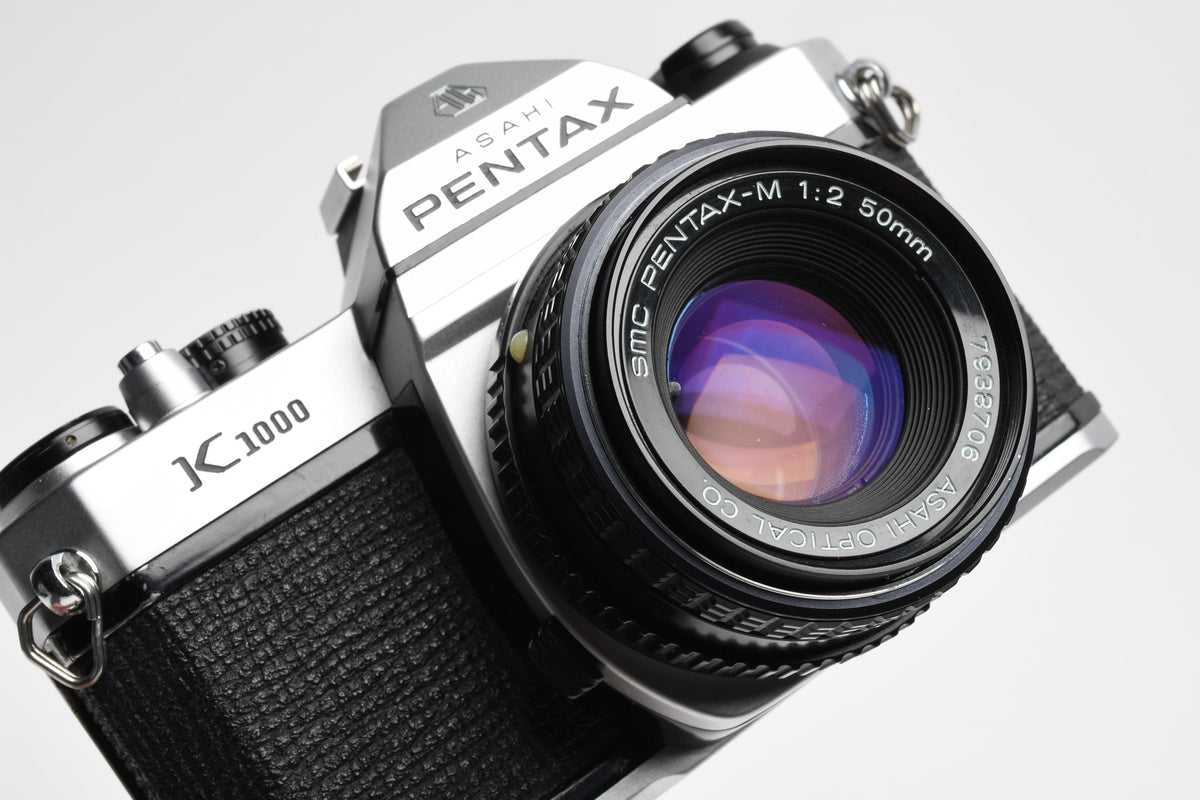 Pentax K1000 35mm SLR w/Pentax-M 50mm f2 lens, New seals