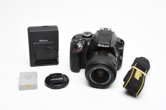Nikon D3300 DSLR w/18-55mm zoom Batt, charger, strap, Only 15,380 Acts