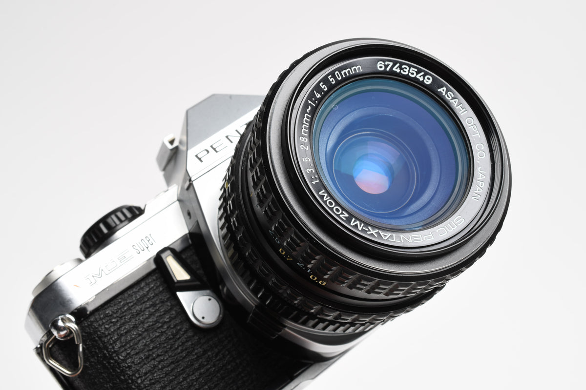 Pentax ME Super 35mm SLR w/28-50mm F3.5-4.5 Lens, Strap, Manual, New seals, Tested