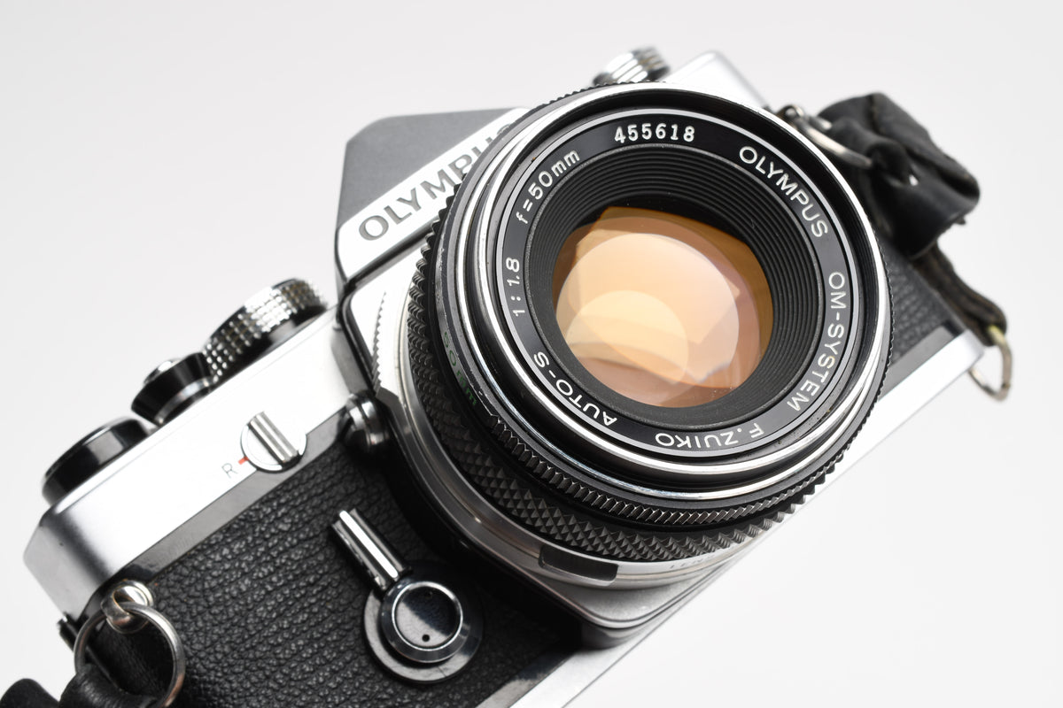 Olympus OM-1 chrome 35mm SLR w/Olympus Zuiko 50mm f/1.8 Lens