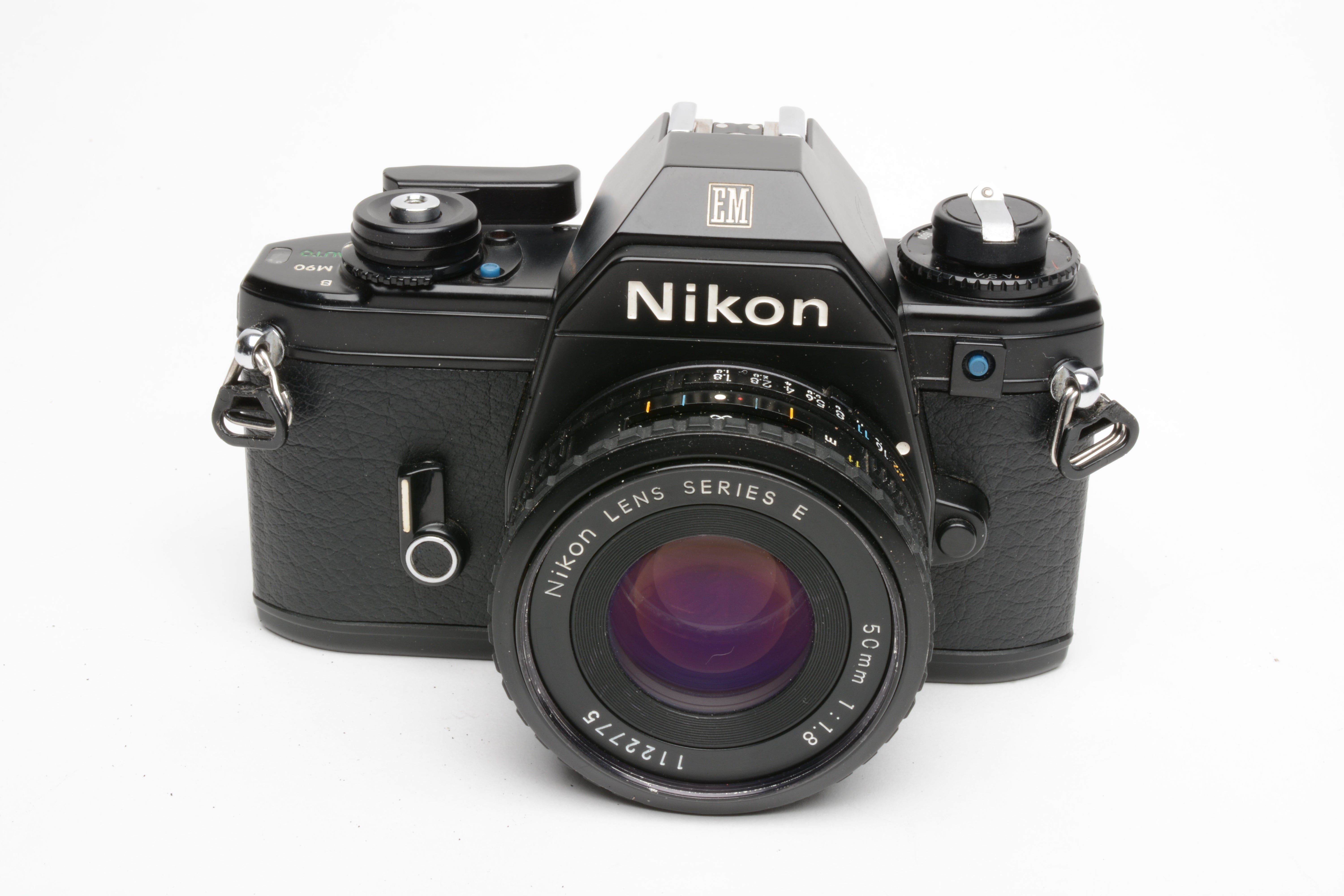 Nikon EM 35mm SLR w/Nikon Series E 50mm f1.8 lens, strap, cap, new 
