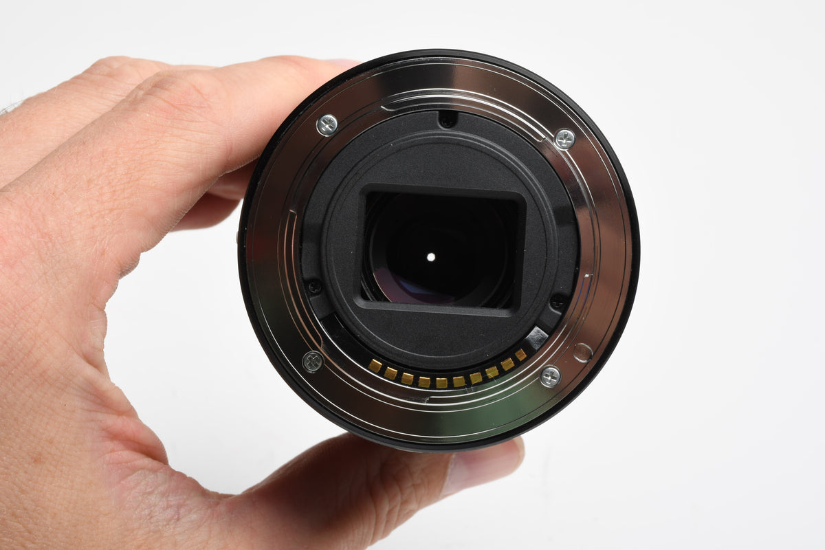 Sony 55-210mm f4.5-6.3 OSS zoom lens (Black) w/Lens caps, Lens hood