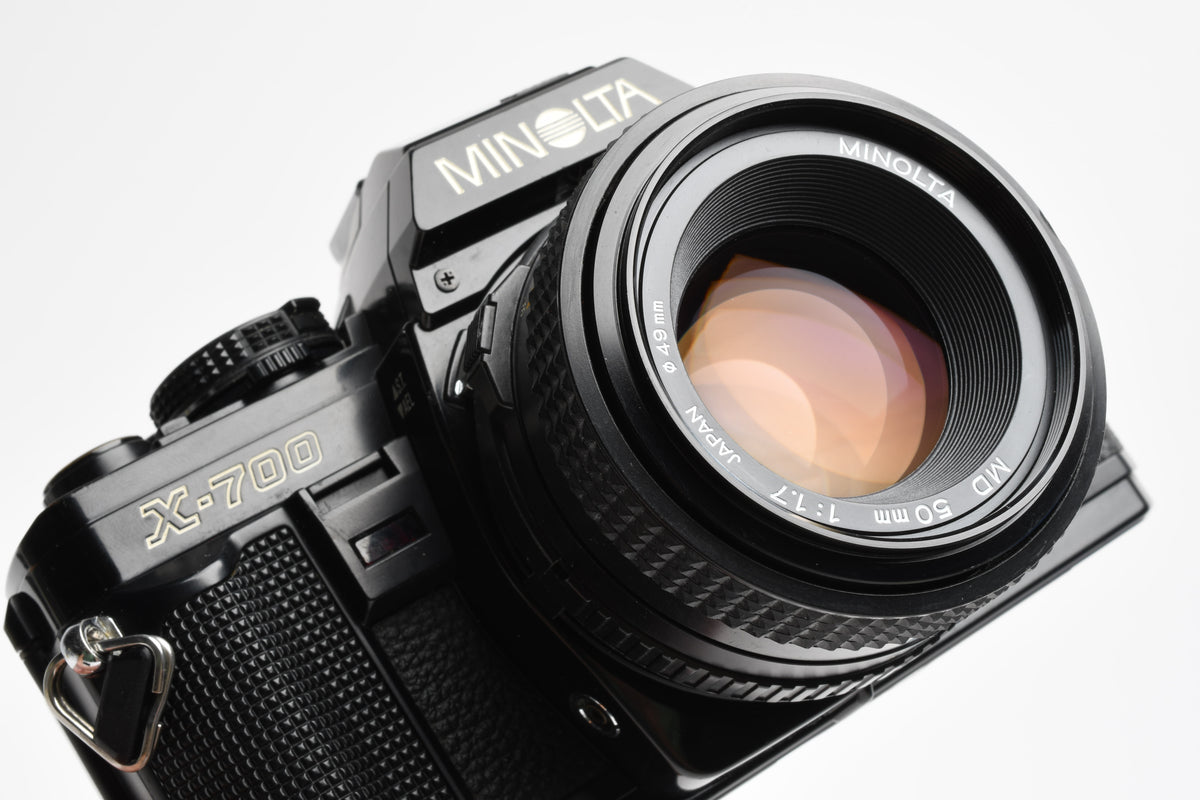Minolta X700 35mm SLR w/50mm f1.7 lens, strap, cap, Sky, new seals, Nice!