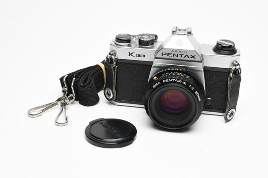 Pentax K1000 35mm SLR w/50mm f2 lens, New seals, strap, Great!