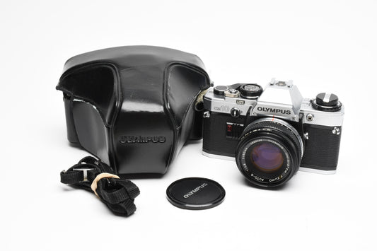 Olympus OM10 35mm SLR Body w/50mm f1.8 lens, Case, New seals, Great!