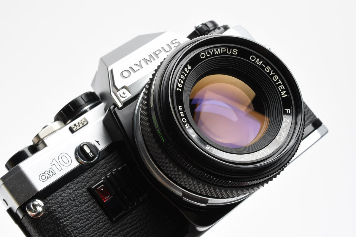 Olympus OM10 35mm SLR Body w/50mm f1.8 lens, Case, New seals, Great!