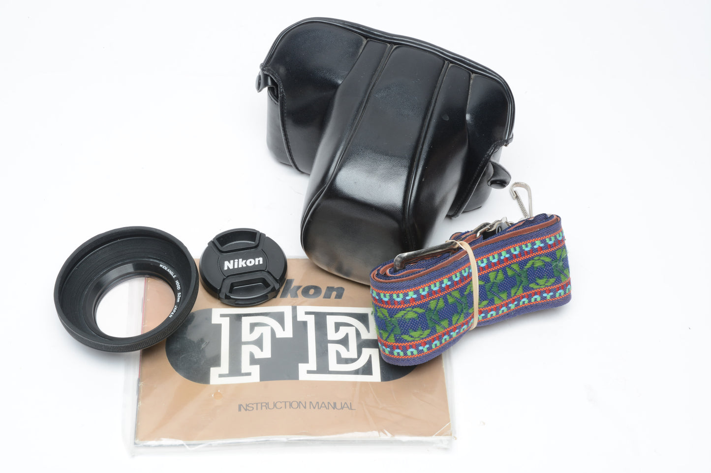 Nikon FE 35mm SLR w/50mm f1.8 E , Strap, New Seals, Case, Tested!