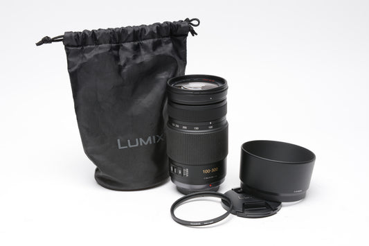 Panasonic Lumix G Vario 100-300mm f4-5.6 Mega O.I.S Lens, UV, Hood, Pouch, Mint-