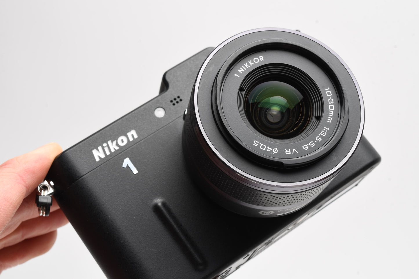 Nikon 1 V1 Mirrorless Camera w/Nikkor 10-30mm lens, UV, batt+charger, Mint-