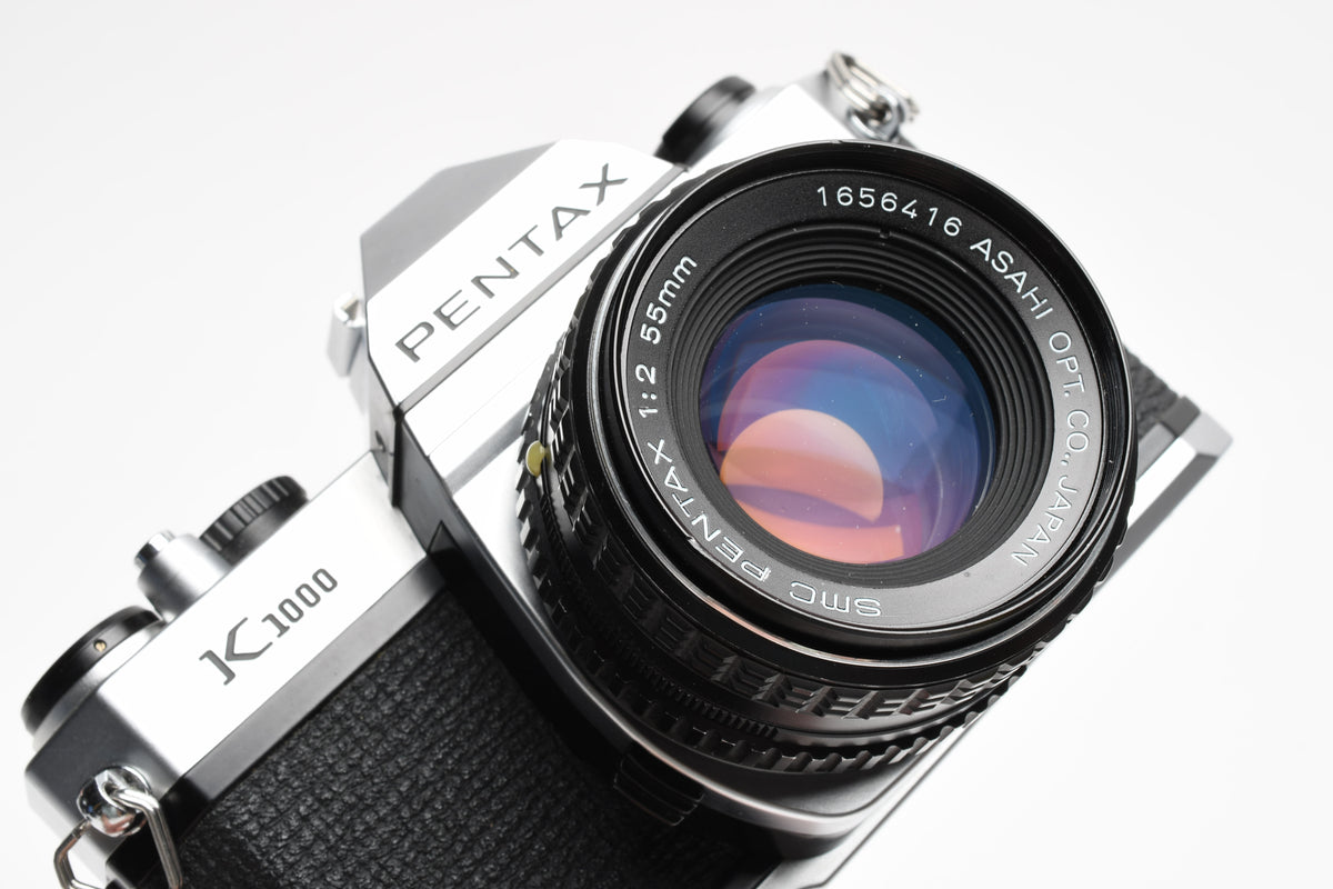 Pentax K1000 35mm SLR w/55mm f2 SMC lens, New seals, strap, Mint-