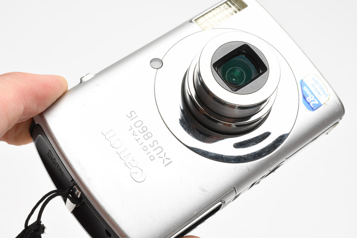 Canon IXUS 860 IS 8MP Digital Point&Shoot w/2X batts+charger+case++