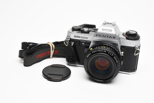 Pentax Super Program 35mm SLR w/50mm F1.7 lens, strap, tested Great!