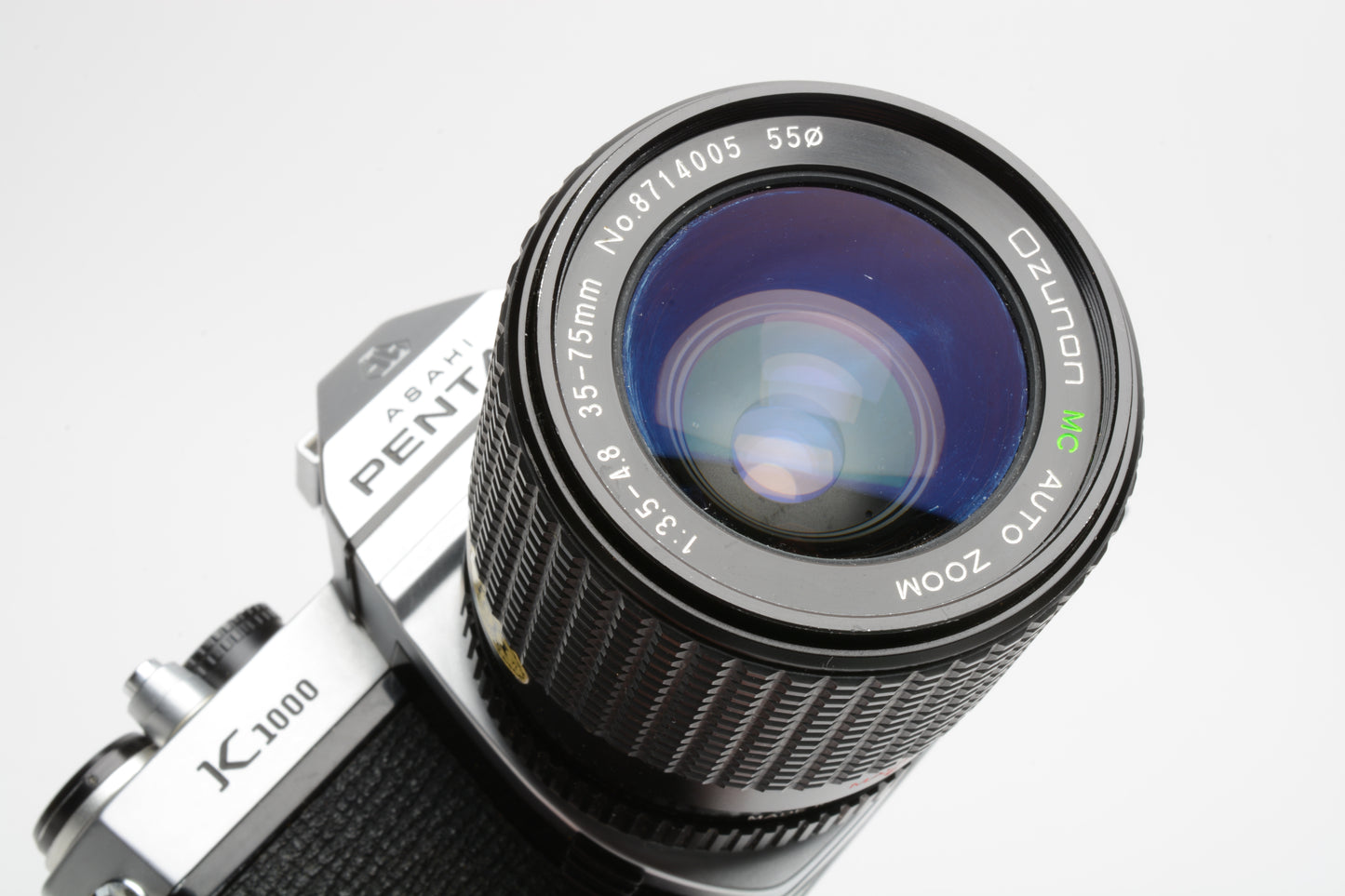 Pentax K1000 35mm SLR Body w/Ozunon 35-75mm zoom, new seals, manual, Nice!!