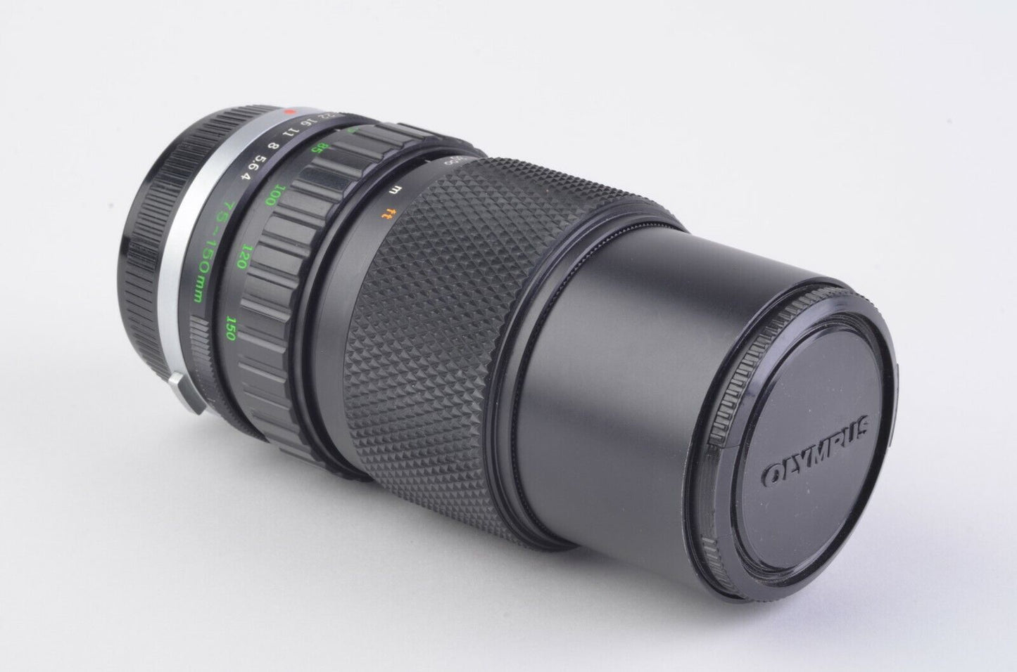 Olympus 75-150mm F4 MF Lens OM Mount, caps, nice, light mold at edge