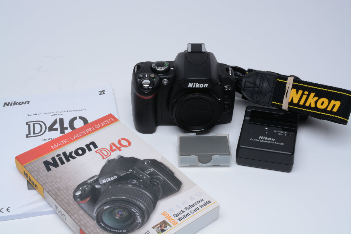Nikon D40 DSLR body, batt+charger+book, ONLY 2421 Acts!! Mint-