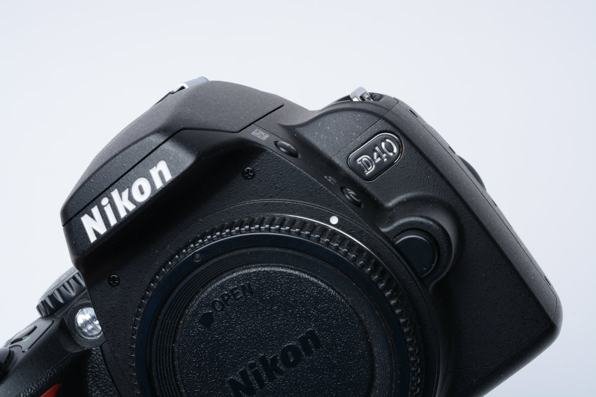 Nikon D40 DSLR body, batt+charger+book, ONLY 2421 Acts!! Mint-
