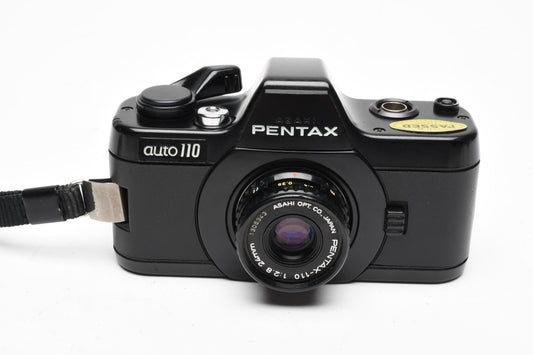 Pentax Auto 110 w/24mm f2.8, case, wrist strap, Tested
