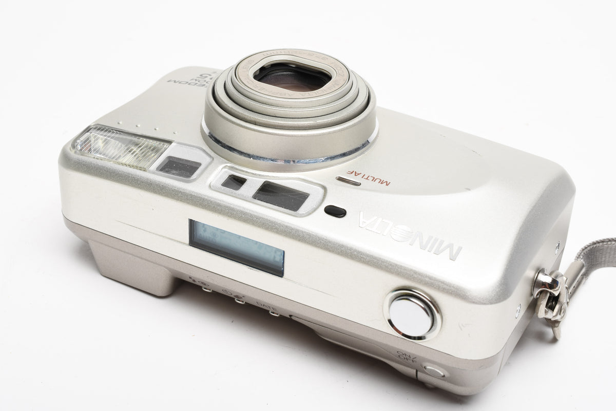 Minolta Freedom Zoom 125 Date 35mm Point&Shoot camera w/ strap, Great!