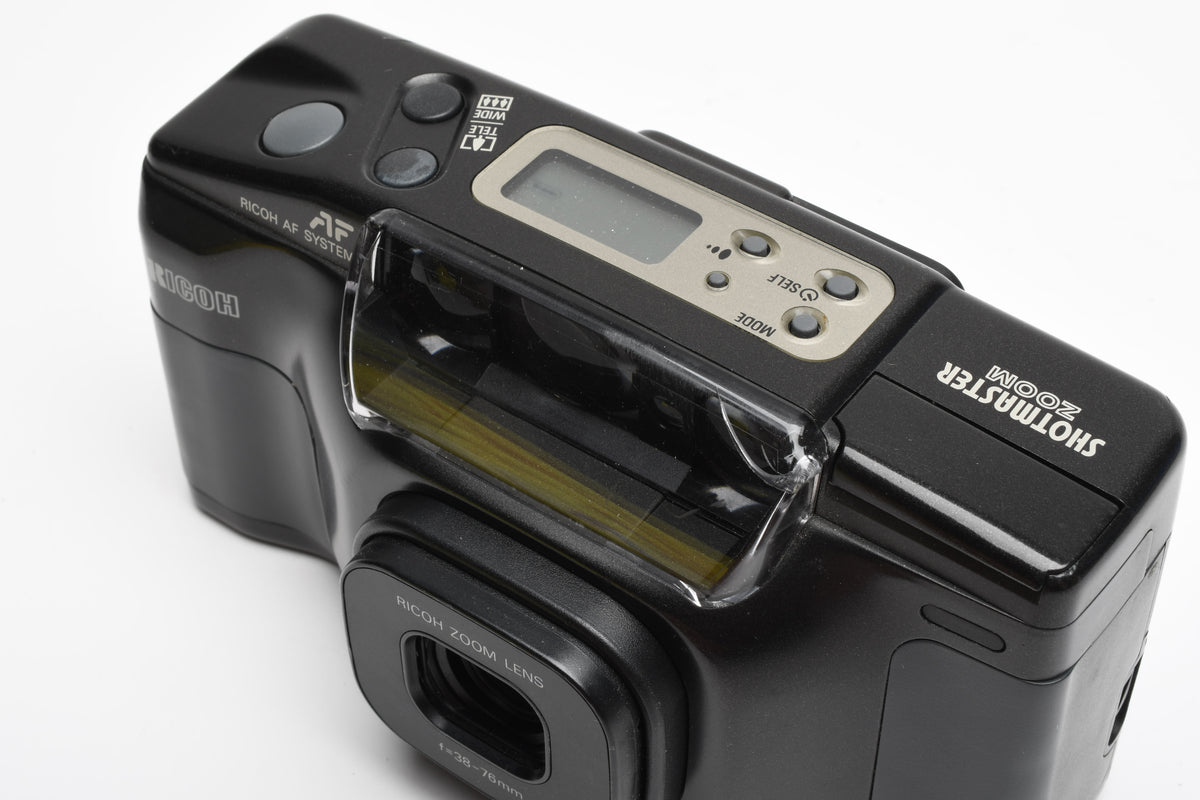 Ricoh Shotmaster Zoom 35mm Point&Shoot w/38-76mm Zoom Lens, Strap, Nice!