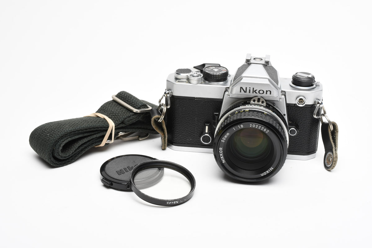 Nikon FM Chrome Body 35mm SLR w/50mm f1.8 lens, New seals, Tested, Great!