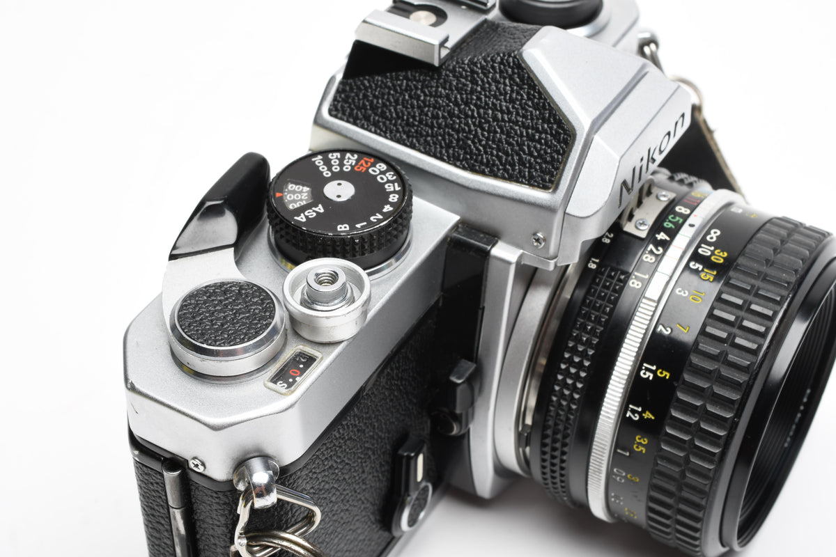 Nikon FM Chrome Body 35mm SLR w/50mm f1.8 lens, New seals, Tested, Great!