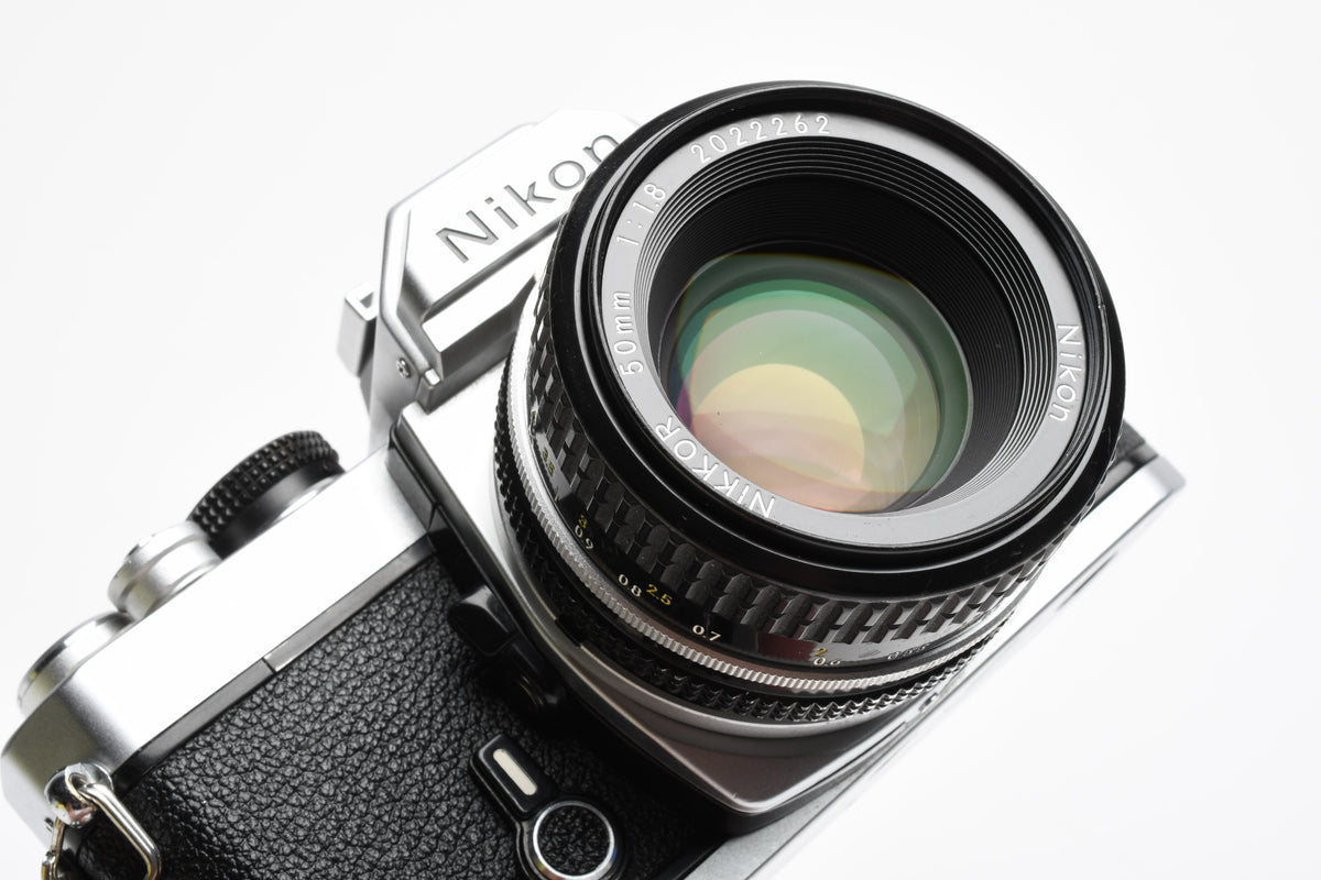 Nikon FM Chrome Body 35mm SLR w/50mm f1.8 lens, New seals, Tested, Great!