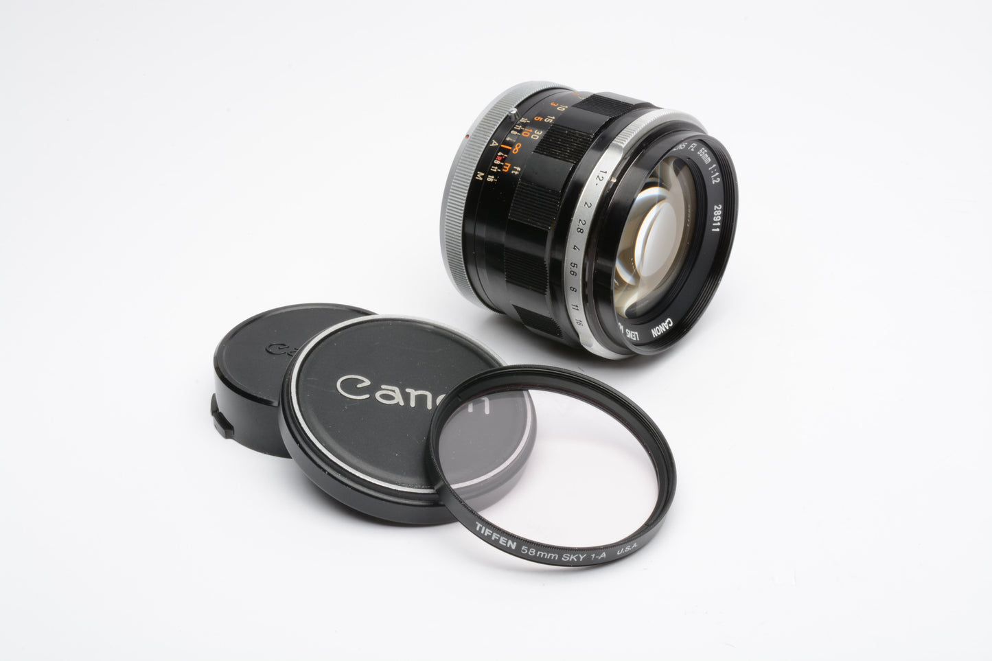 Canon FL 55mm f1.2 Prime lens, UV, caps, nice and sharp Caps + UV