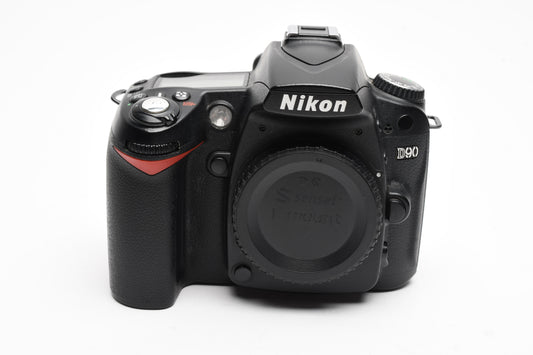 Nikon D90 DSLR body, batt, charger, strap, 2X books, 14K Acts
