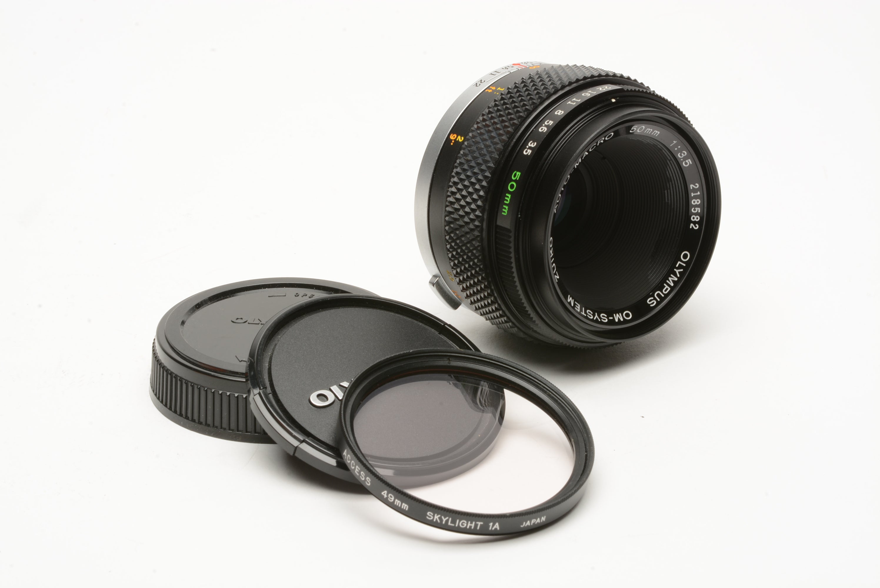 Olympus OM-System 50mm f3.5 Auto Macro lens w/caps, sky filter