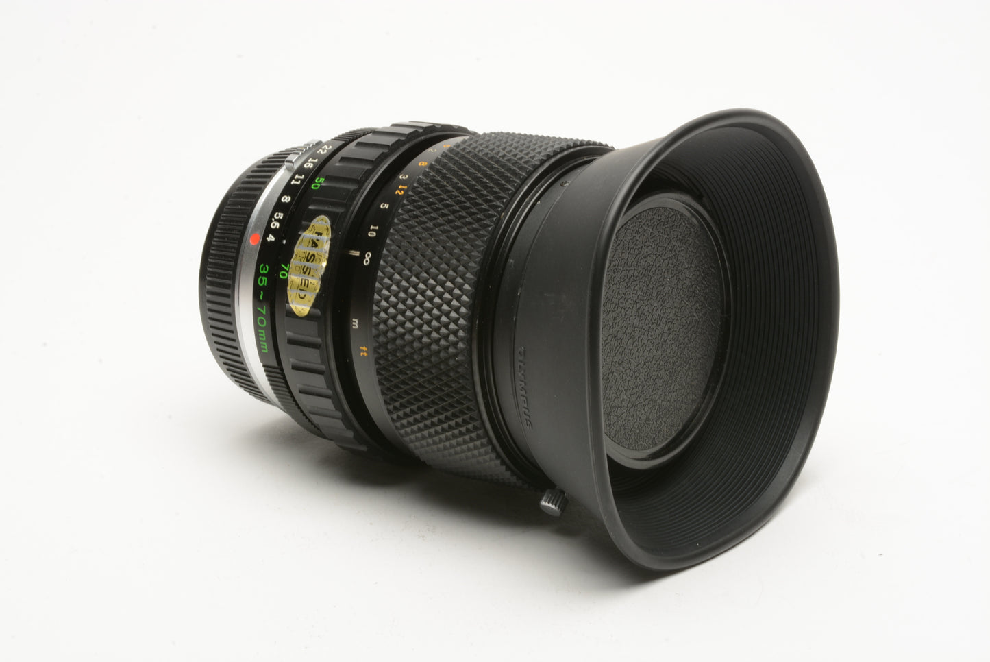 Olympus OM-System 35-70mm f4 zoom lens, hood, caps, UV