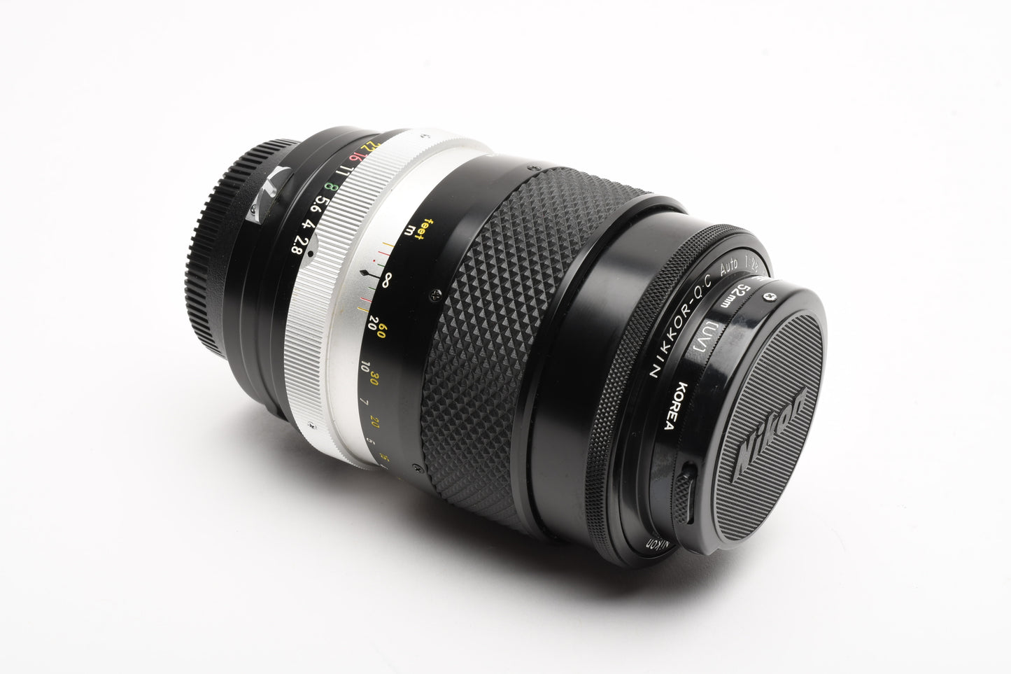 Nikon Nikkor-Q.C 135mm f2.8 Non-AI lens, caps, Mint- + UV