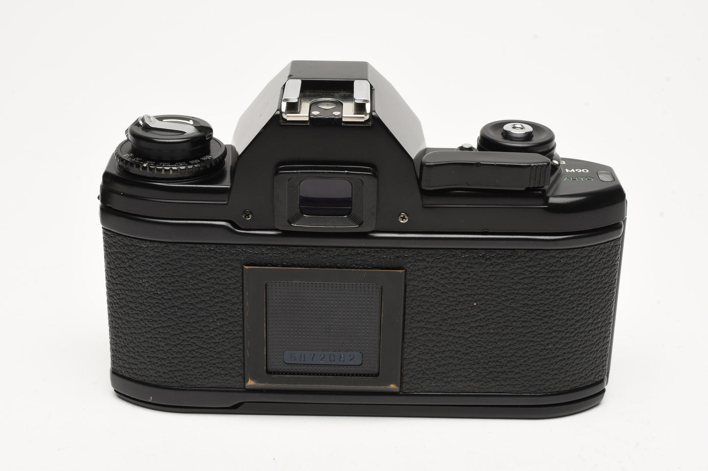 Nikon EM 35mm SLR w/Nikon Nikkor 50mm f1.8 lens, strap, cap, new seals