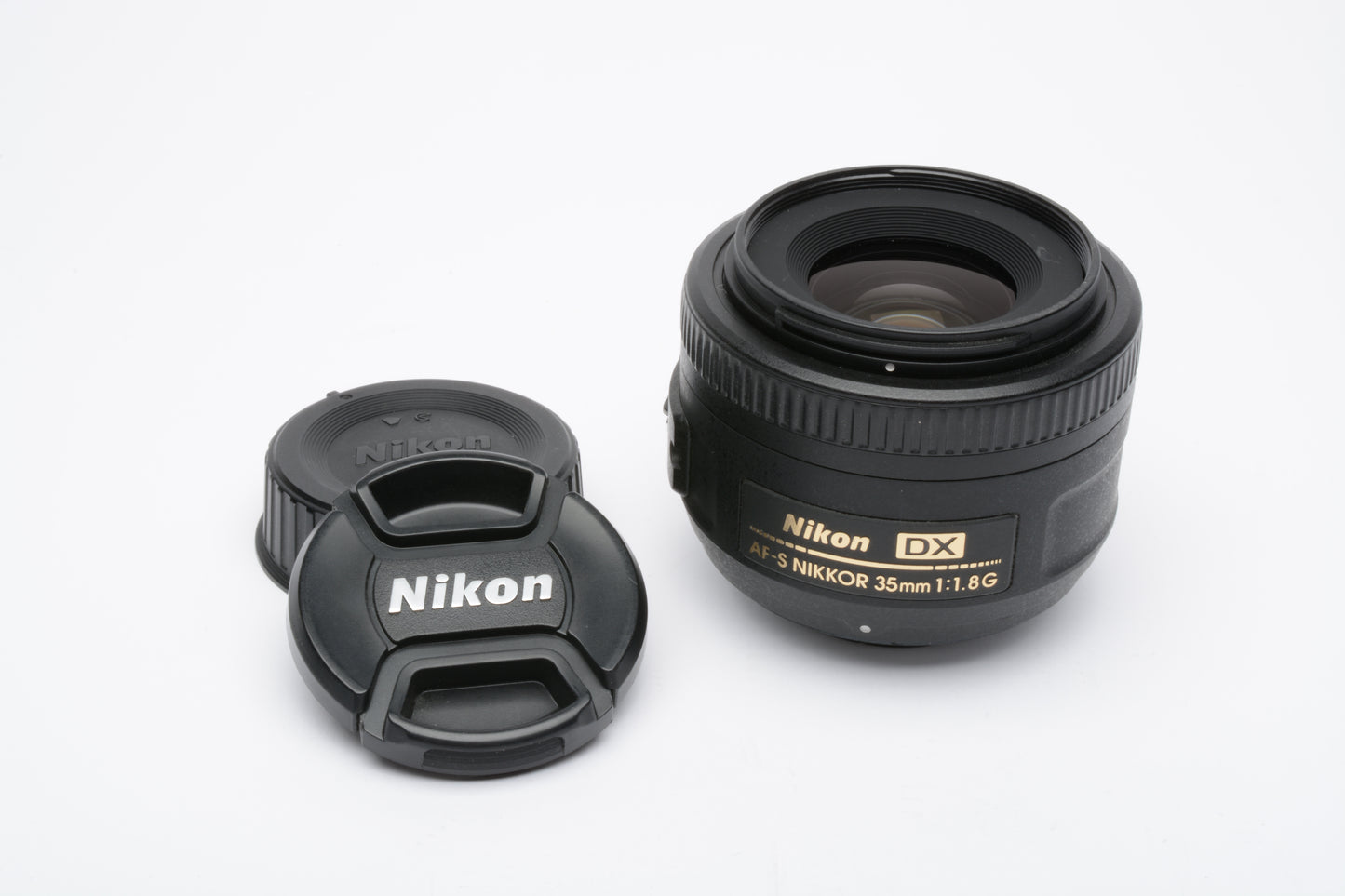 Nikon AF-S Nikkor 35mm f1.8G DX lens, caps, very clean