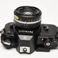 Nikon EM 35mm SLR w/Nikon Nikkor 50mm f1.8 lens, strap, cap, new seals